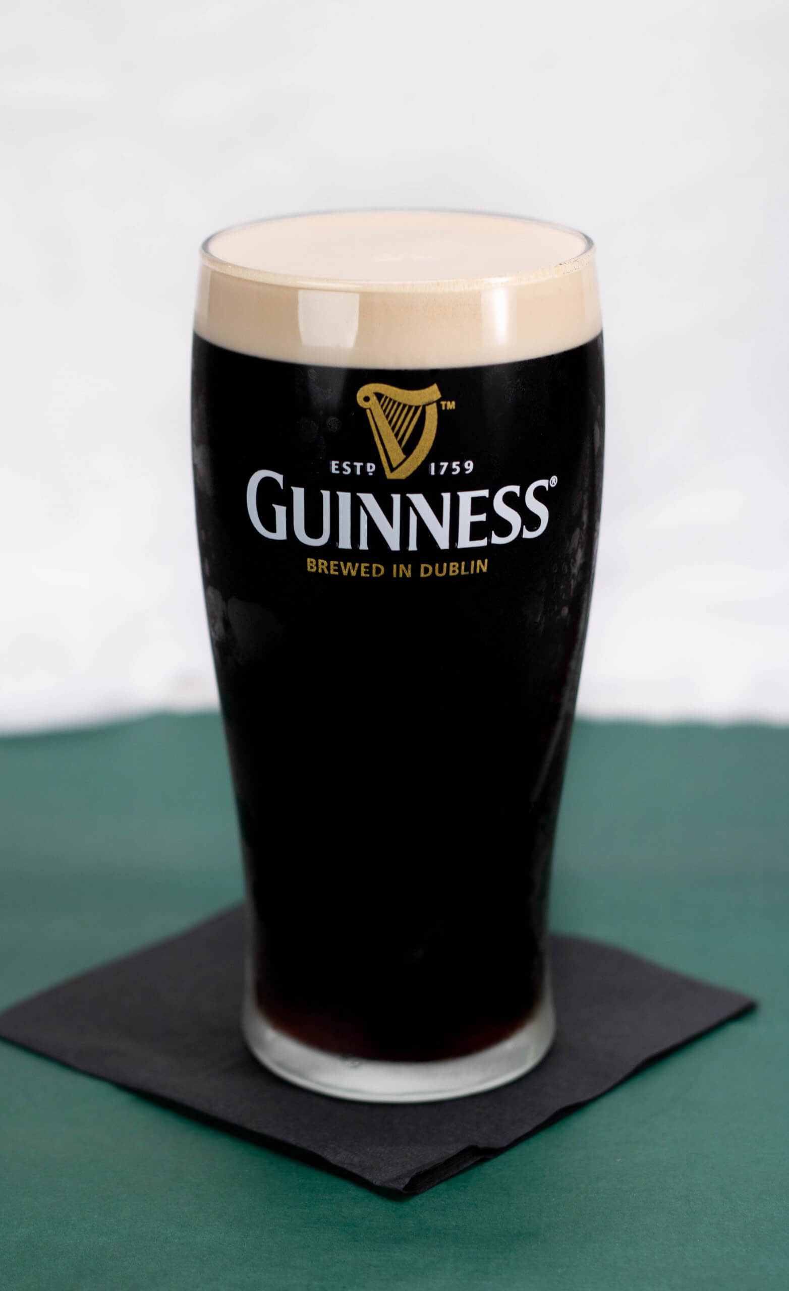 Guinness glass filled with beer